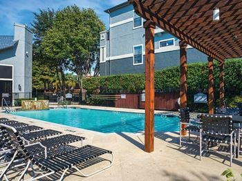 Swimming pool with shaded pergola